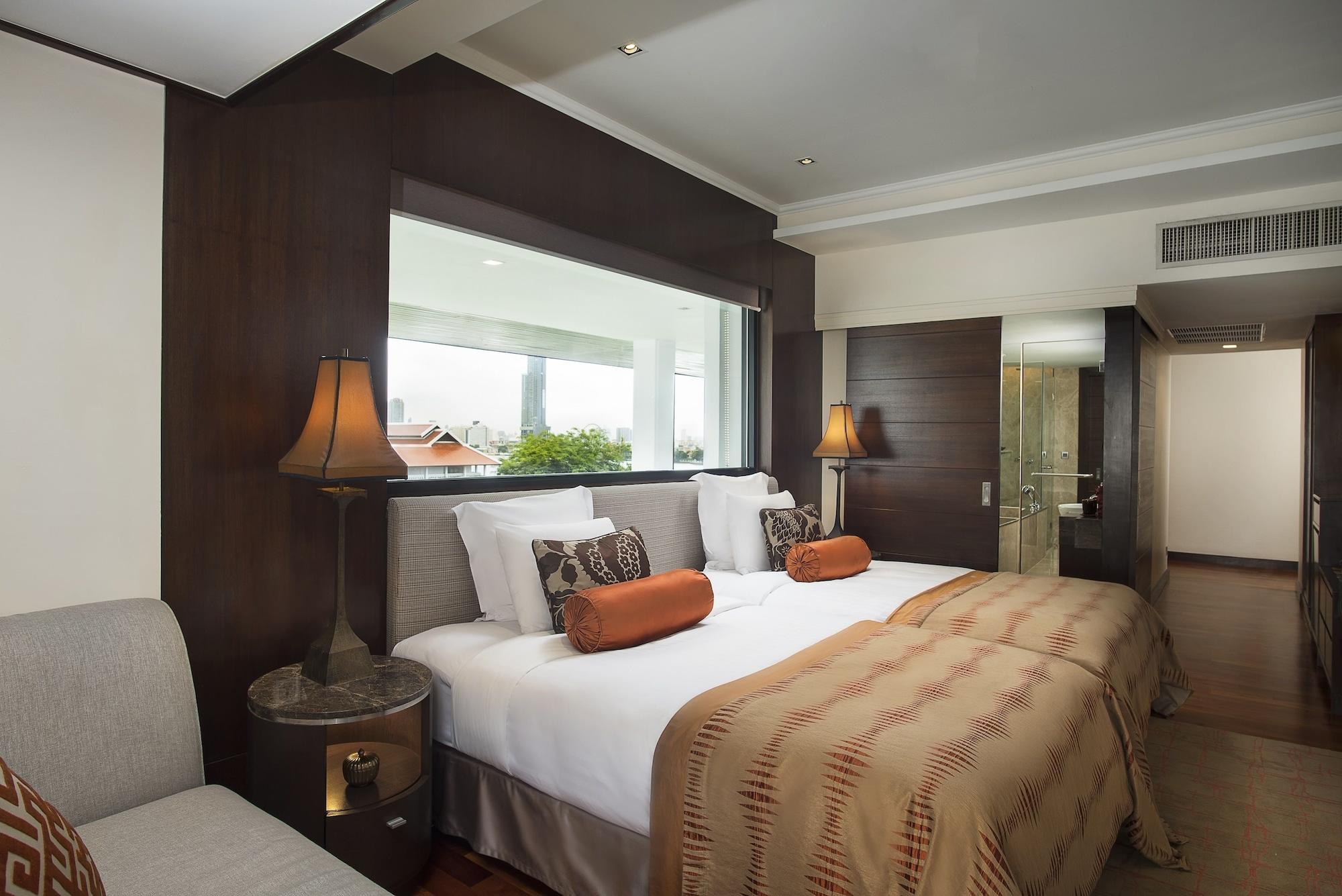 Anantara Riverside Bangkok Resort Экстерьер фото A bedroom at the Taj Mahal Palace