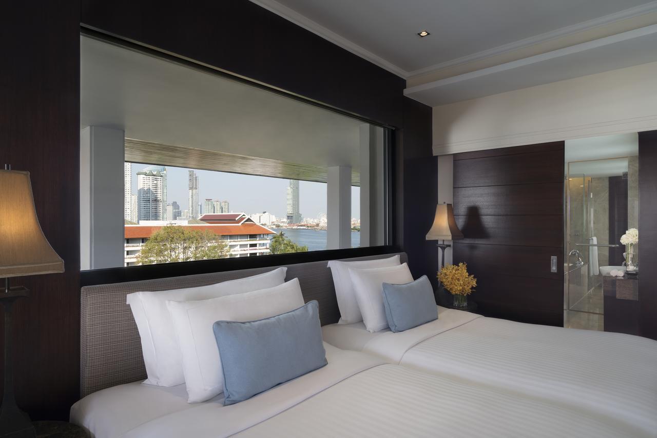 Anantara Riverside Bangkok Resort Экстерьер фото A bedroom at the hotel